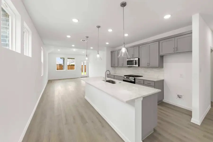 Open Kitchen-Living-Dining Room Representative Photo featuring the Milan Collection