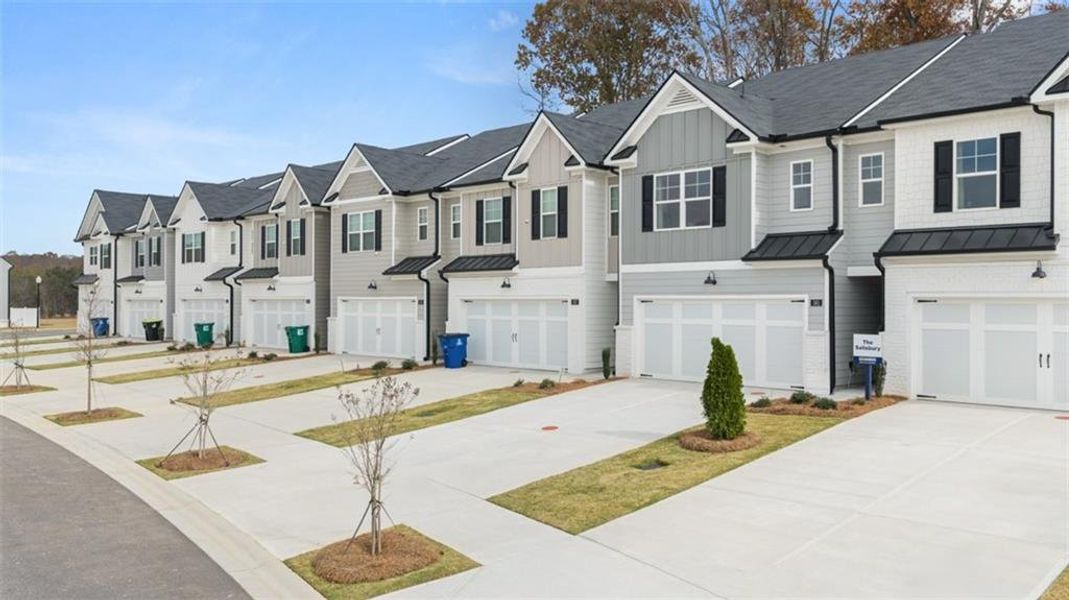 Front exterior of a new home in Echo Glen, Stockbridge, GA, highlighting curb appeal (Image 26).