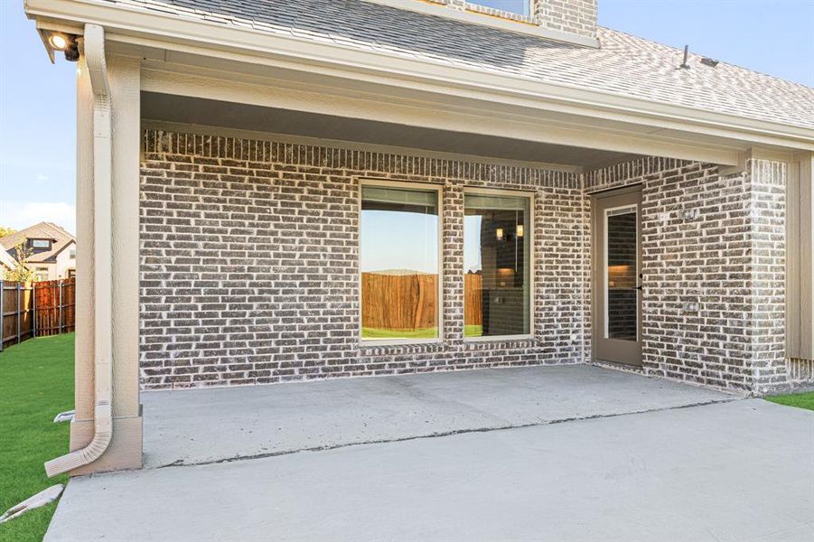 Exterior details and patio area of a home in Villages of Walnut Grove, Midlothian (Image 19). Exterior details and patio area of a home in Villages of Walnut Grove, Midlothian (Image 19).