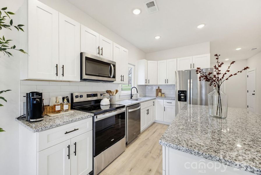 Furnished interior view inside a new home in , Hickory (Image 17).