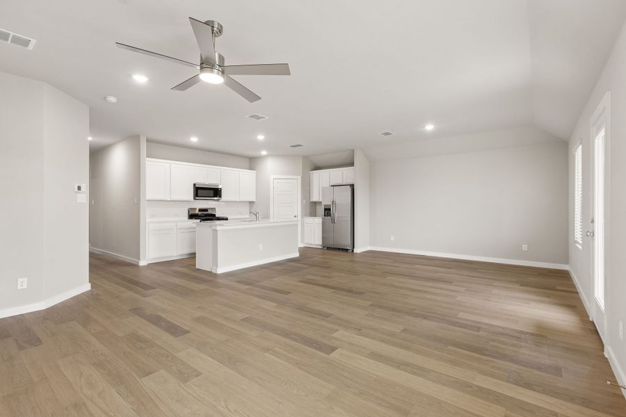 Open Floor Plan in the Emmy II home plan by Trophy Signature Homes - REPRESENTATIVE PHOTO