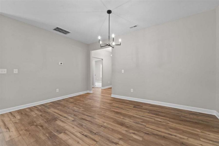 Representative unfurnished interior of a home built from the Weymouth by Caviness & Cates Communities in Bartlett Manor, Youngsville (Image 48).