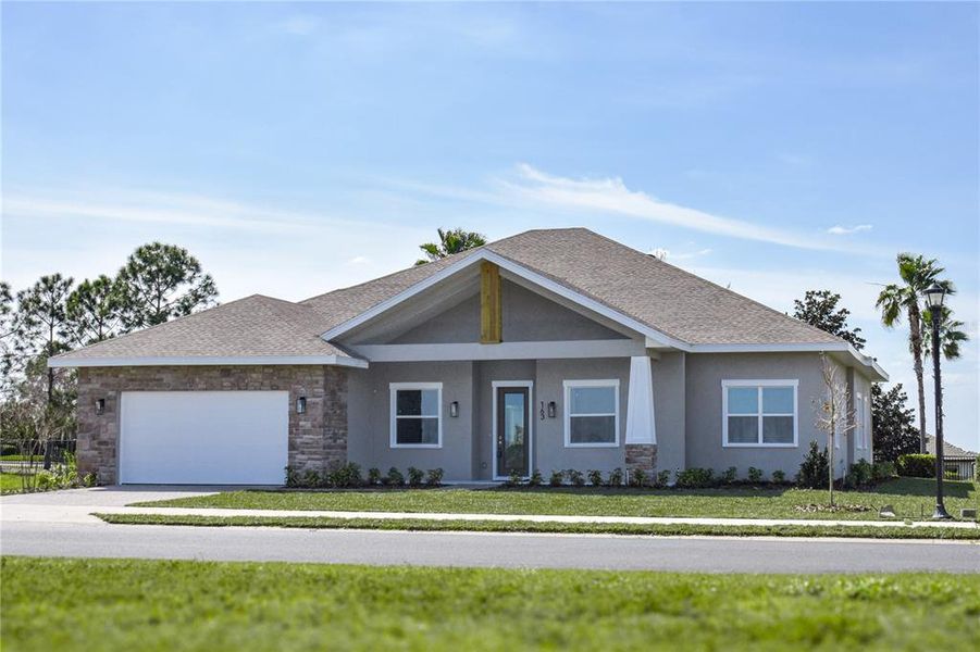 Front exterior of a new home in , Lake Alfred, FL, highlighting curb appeal (Image 26).