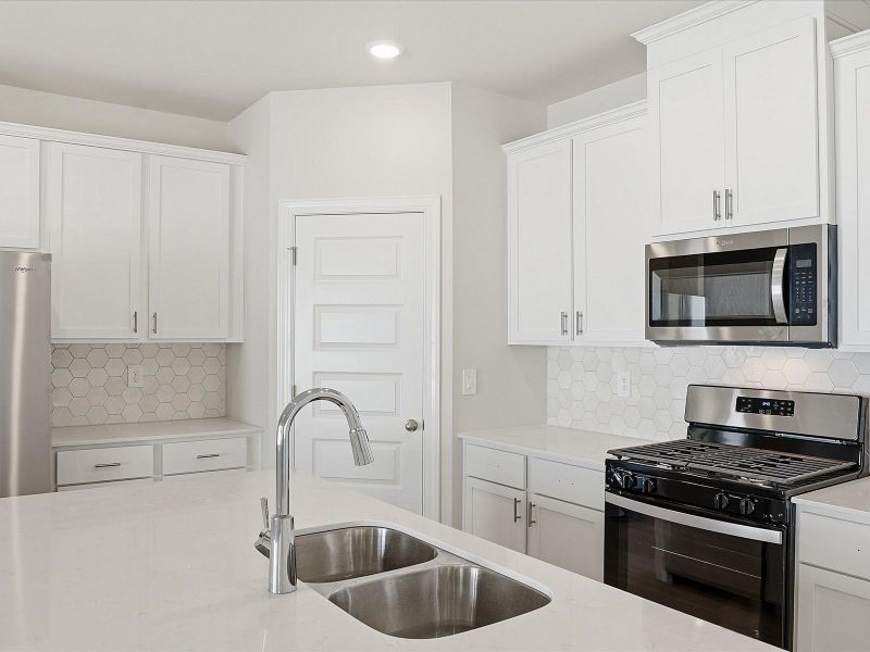 Furnished interior view inside a new home in Brayfield Manor - Heritage Collection, Wellford (Image 6).