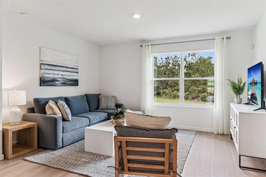 Furnished interior view inside a new home in Crossroads at Kelly Park, Apopka (Image 6).