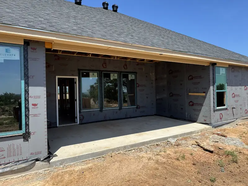 Front exterior of a new home in Stagecoach Crossing, Bridgeport, TX, highlighting curb appeal (Image 4). Front exterior of a new home in Stagecoach Crossing, Bridgeport, TX, highlighting curb appeal (Image 4).