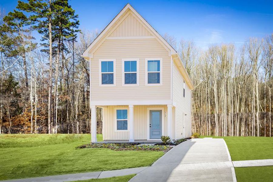 Representative exterior photo of a completed home built from the Tate by Ryan Homes in Middle Creek Village Coastal Cottages & Villas, Bolivia, NC (Image 1).