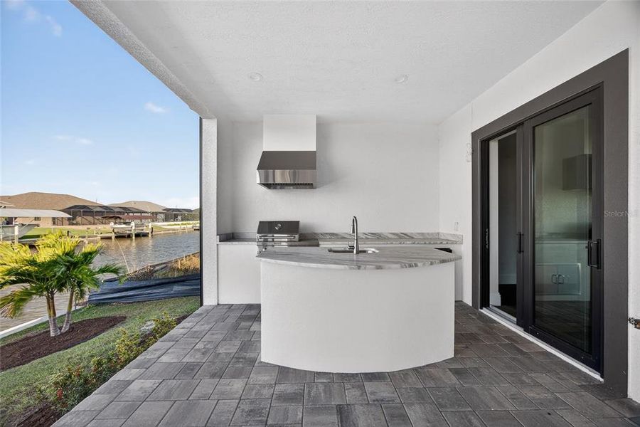Exterior details and patio area of a home in , Port Charlotte (Image 20).