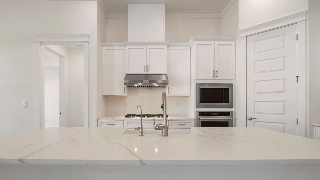 Furnished interior view inside a new home in Breakfast Point East Phase II, Panama City Beach (Image 4).