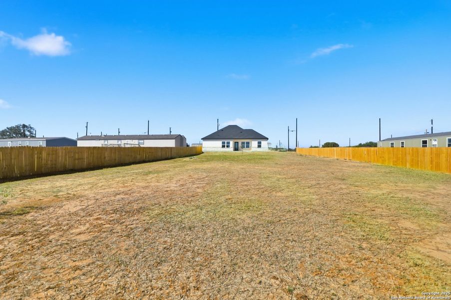 Exterior details and patio area of a home in , Atascosa (Image 26).