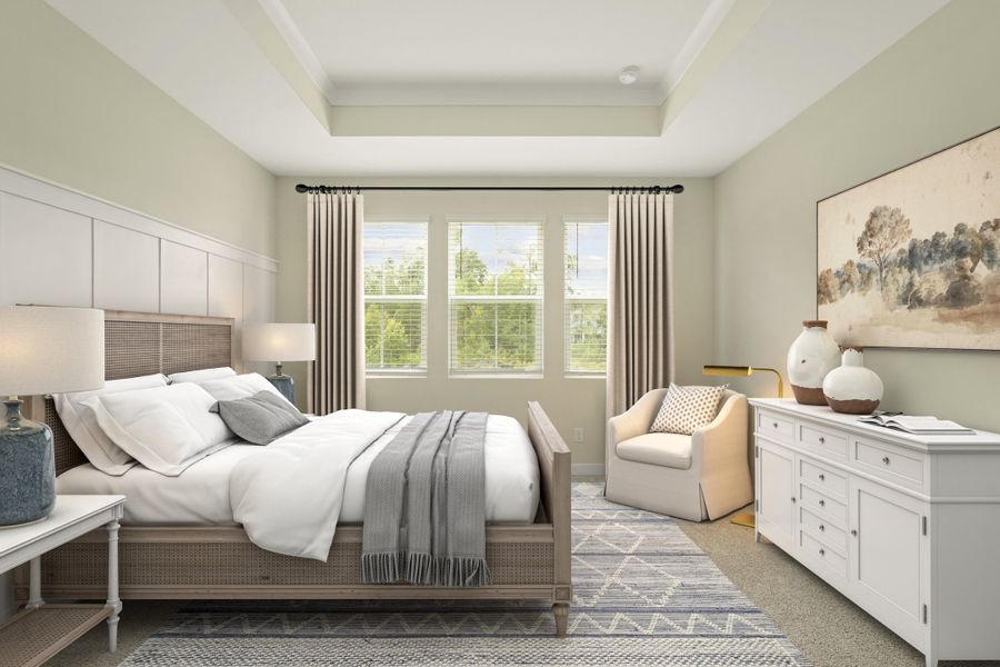 Primary suite with decorated feature wall & tray ceiling