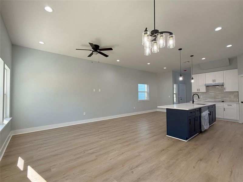 Elegant Formal Dining, Spacious Living Area, and Cozy Breakfast Nook seamlessly connected in an open-concept floor plan!