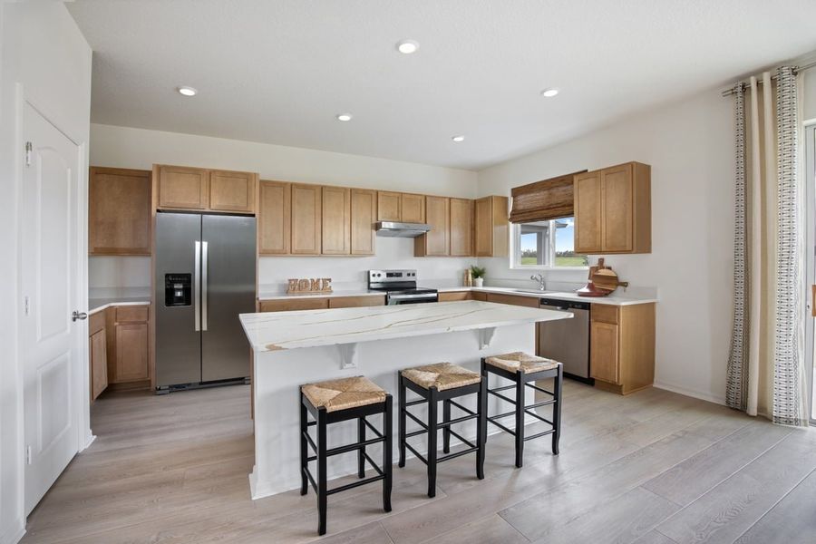 Representative furnished interior of a home built from the 2387 Modeled by KB Home in Robins Run, Lake Wales (Image 8).