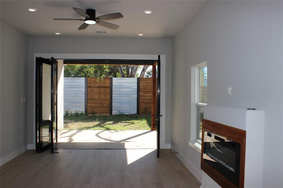 Entryway featuring hardwood / wood-style floors and ceiling fan