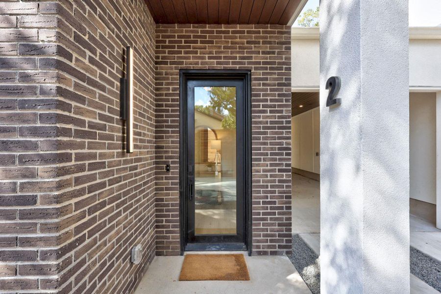 Exterior details and patio area of a home in , Austin (Image 1).