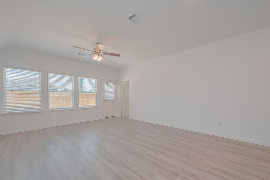 Spacious, unfurnished interior of a new home in Sunterra, Katy (Image 27).