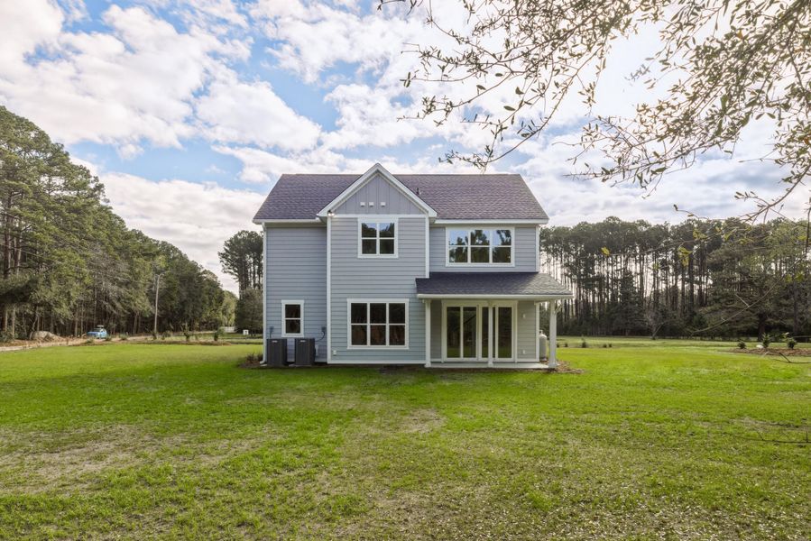 Exterior details and patio area of a home in , Johns Island (Image 36).