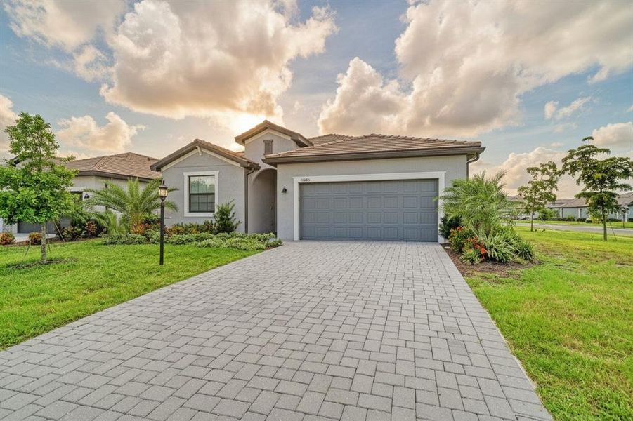 Front exterior of a new home in , Bradenton, FL, highlighting curb appeal (Image 27). Front exterior of a new home in , Bradenton, FL, highlighting curb appeal (Image 27).
