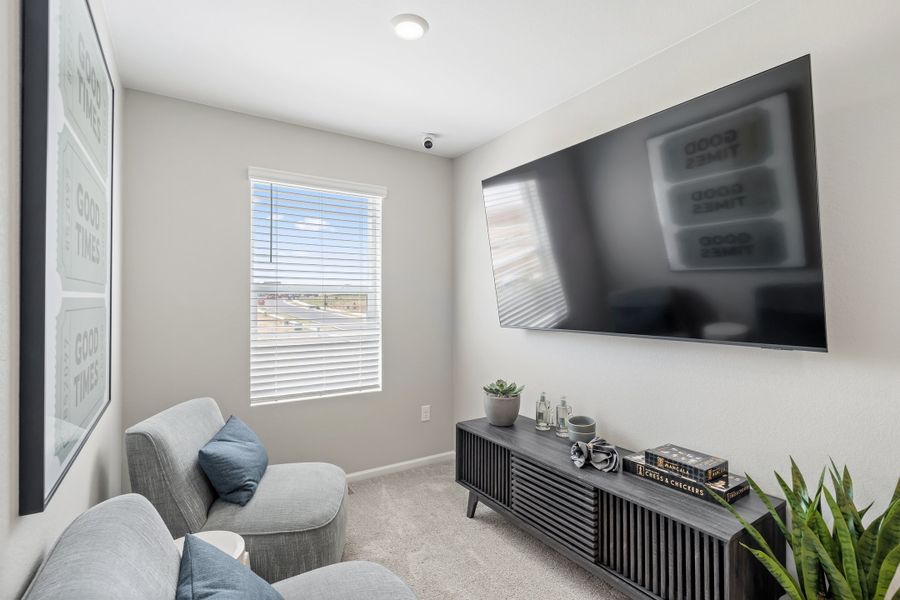 Representative furnished interior of a home built from the 2403 by Risewell Homes in Harvest Crossing, Aurora (Image 6).