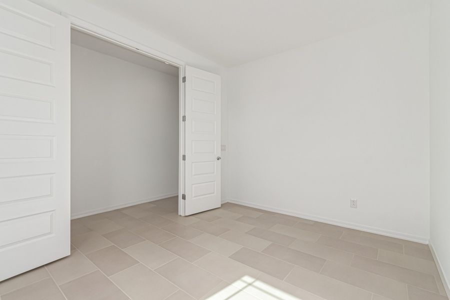Representative unfurnished interior of a home built from the Glenstone by Taylor Morrison in Lucero Discovery Collection, Goodyear (Image 20).