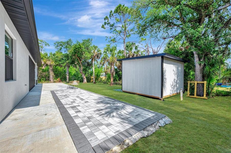 Exterior details and patio area of a home in , North Port (Image 37).