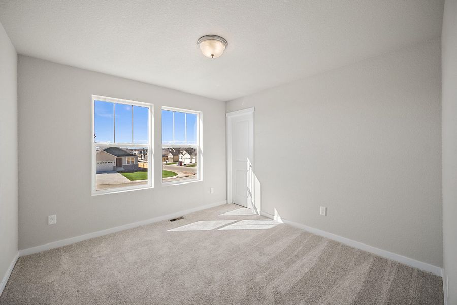 Spacious, unfurnished interior of a new home in The Glen-12, Colorado Springs (Image 35).