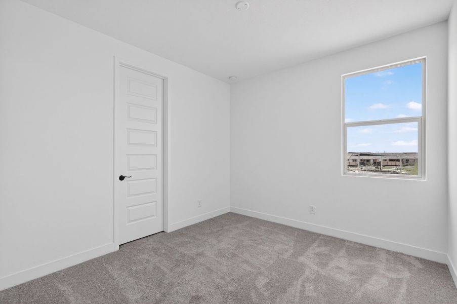 Spacious, unfurnished interior of a new home in Artisan at Asante, Surprise (Image 24).