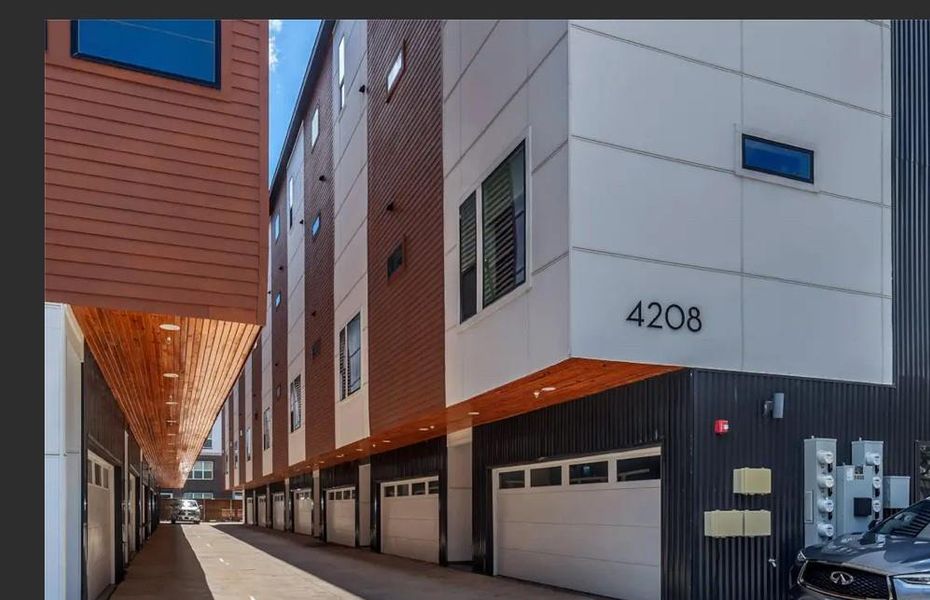 View of property featuring a garage View of property featuring a garage