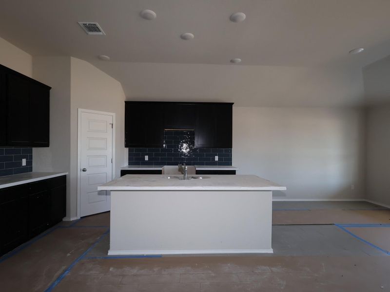 In-progress construction of a new home in Carillon, Manor, TX (Image 13).