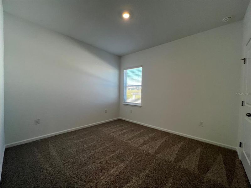 Spacious, unfurnished interior of a new home in Hills of Minneola, Minneola (Image 15).