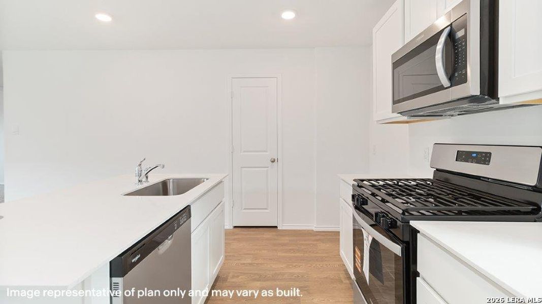 Furnished interior view inside a new home in Hickory Ridge, Elmendorf (Image 6).