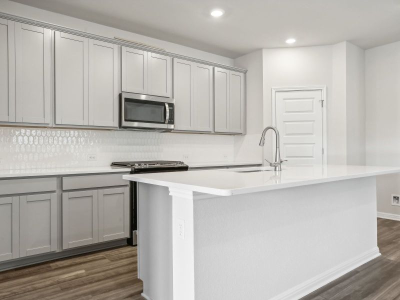 Cook a delicious meal in this beautiful kitchen.