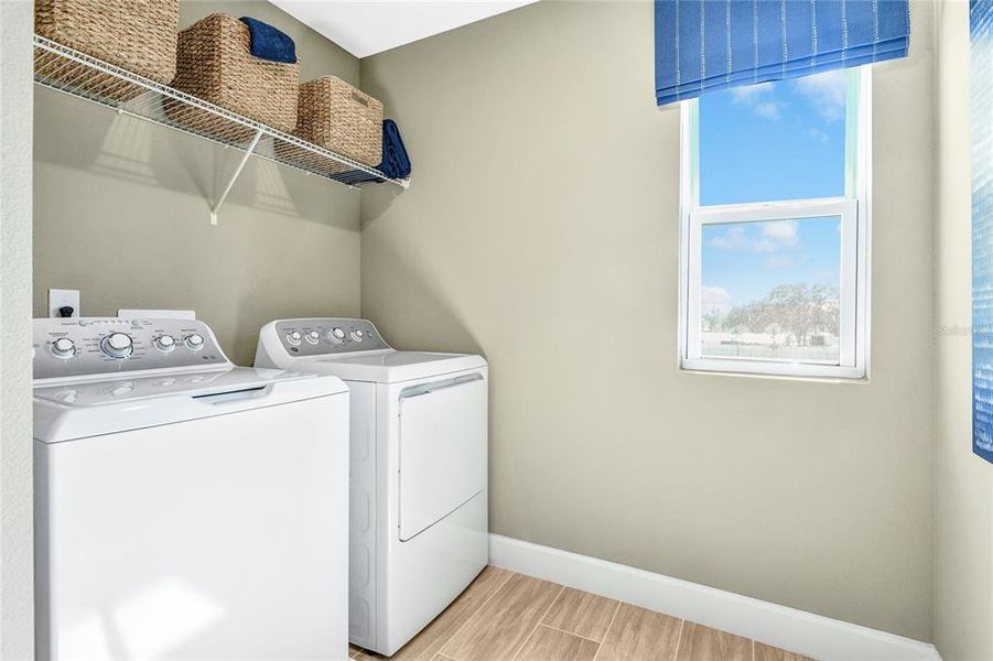 Furnished interior view inside a new home in Seaport Village, Tavares (Image 9).