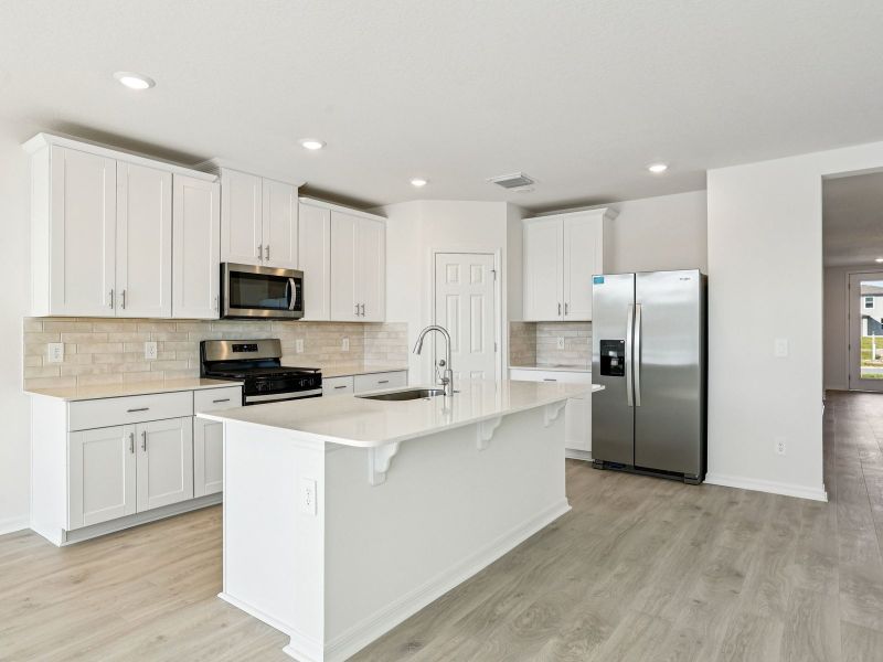 Furnished interior view inside a new home in The Reserve at Twin Lakes, St. Cloud (Image 3).