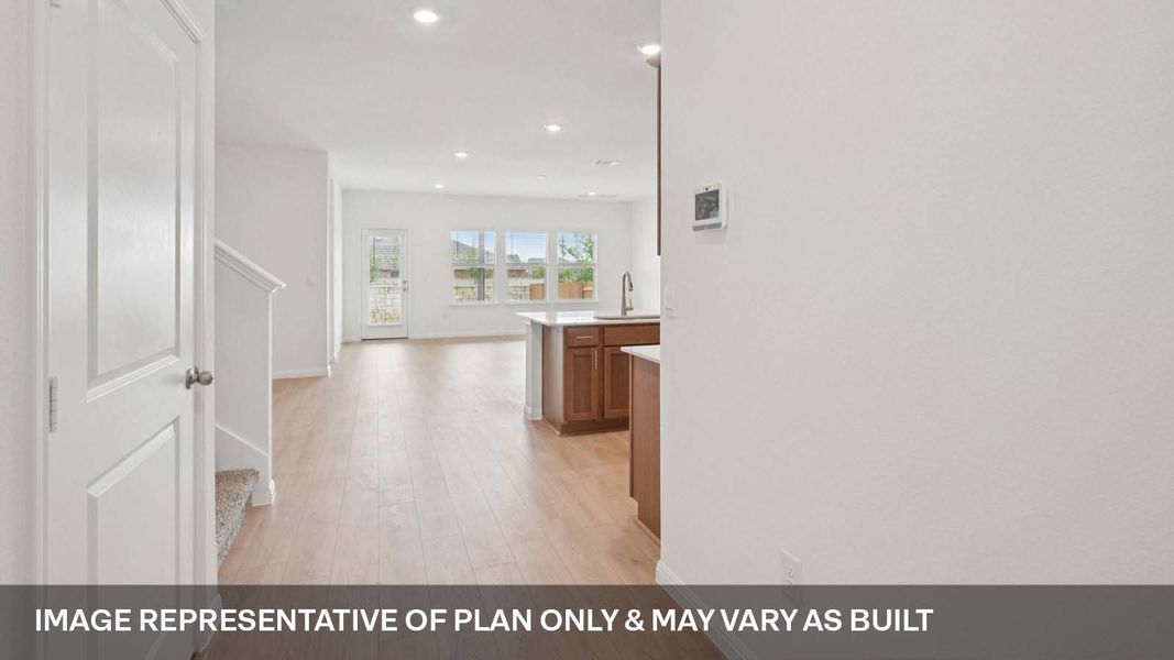 Representative unfurnished interior of a home built from the The Ozark by D.R. Horton in Bar W Ranch, Leander (Image 12).