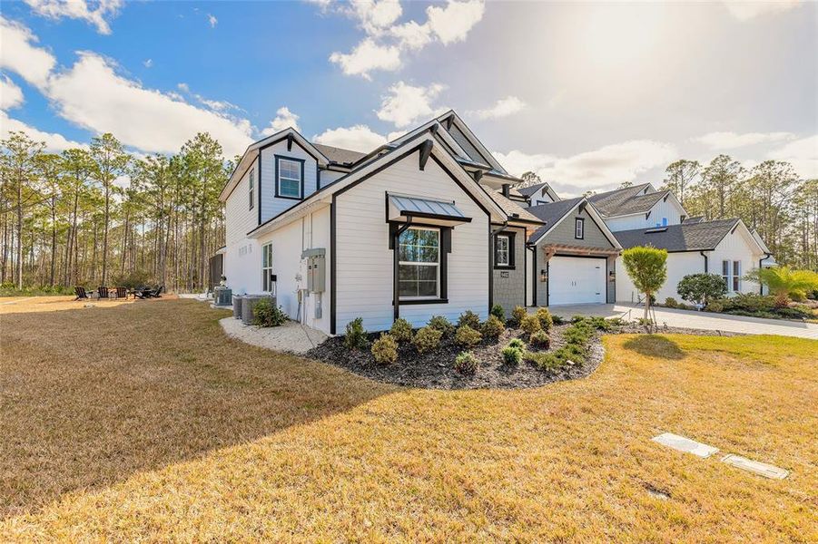 Front exterior of a new home in , Port Orange, FL, highlighting curb appeal (Image 26).