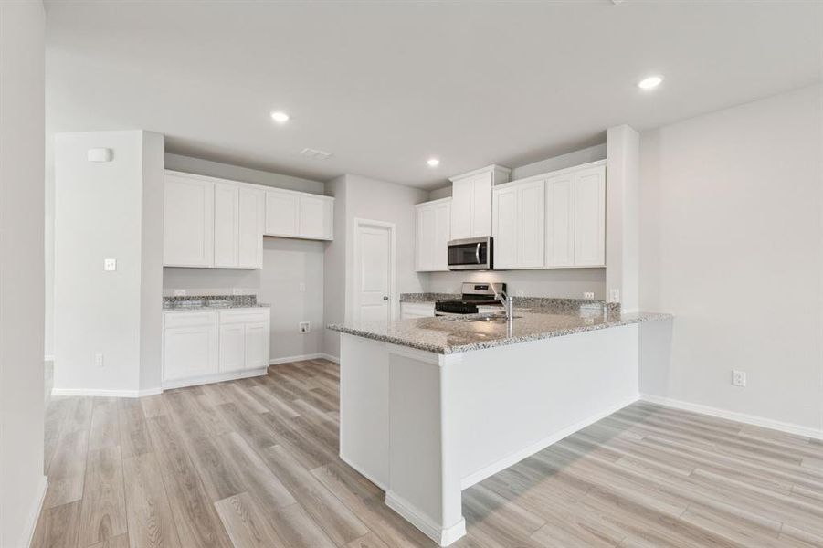 Furnished interior view inside a new home in AnaCapri, Anna (Image 7).