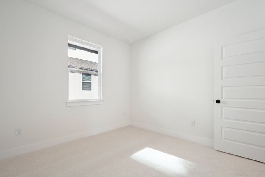 Spacious, unfurnished interior of a new home in Koenig Townhomes, Austin (Image 31).