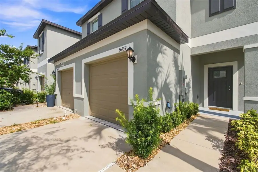 Exterior details and patio area of a home in , Zephyrhills (Image 3).