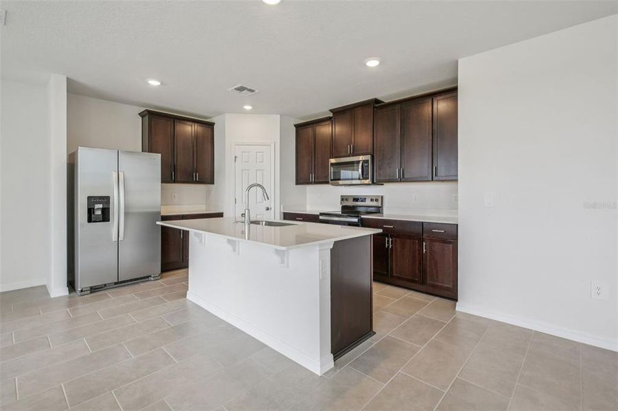 Furnished interior view inside a new home in Springs at Lake Alfred - Classic Series, Lake Alfred (Image 8).