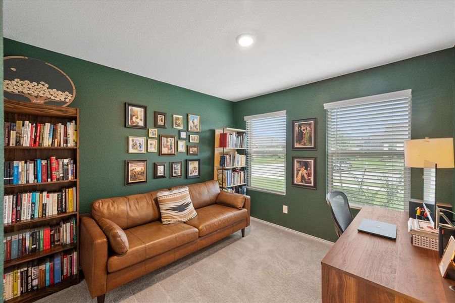 Office area with carpet and baseboards