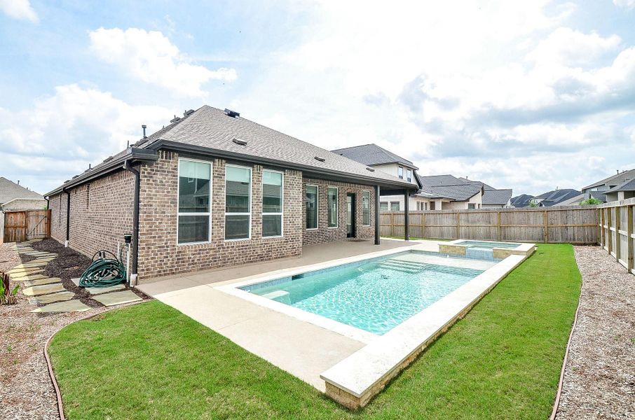 View showcasing the flagstone path on the side of the home
