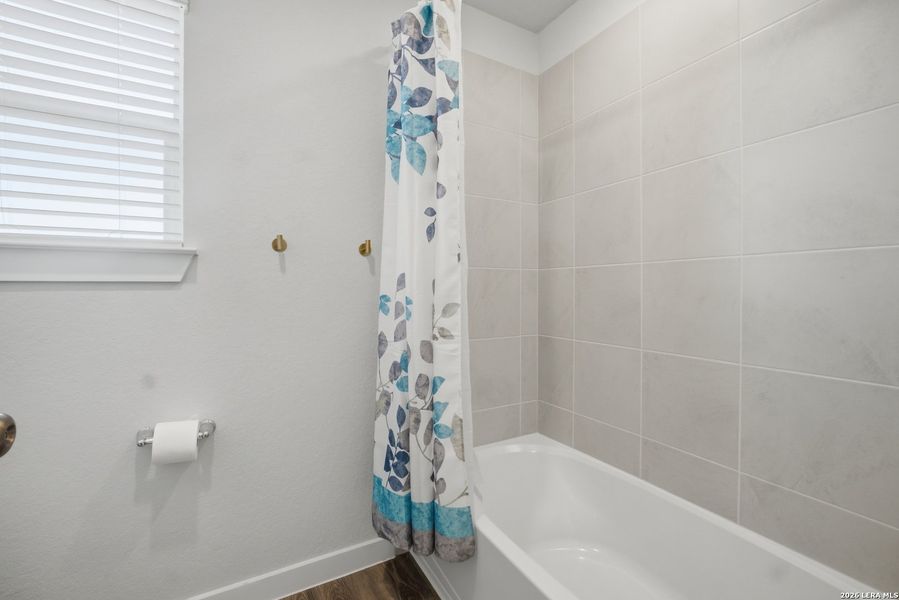 Furnished interior view inside a new home in Senna, San Antonio (Image 8).