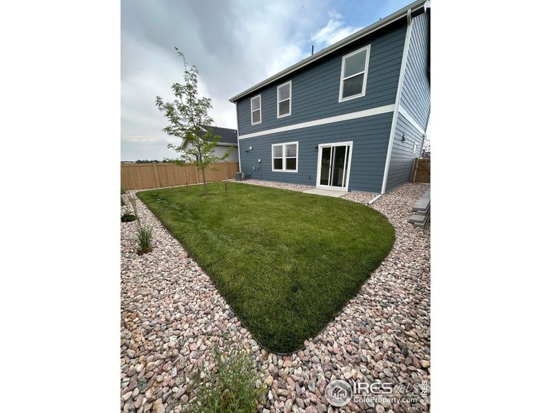 Front exterior of a new home in Sage Meadows, Wellington, CO, highlighting curb appeal (Image 2).