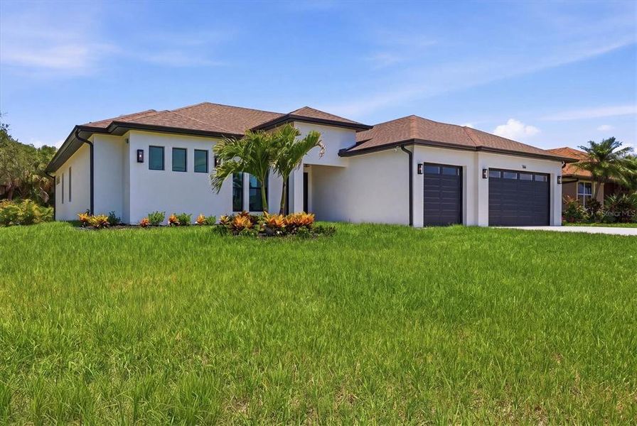 Front exterior of a new home in , Rotonda West, FL, highlighting curb appeal (Image 24).