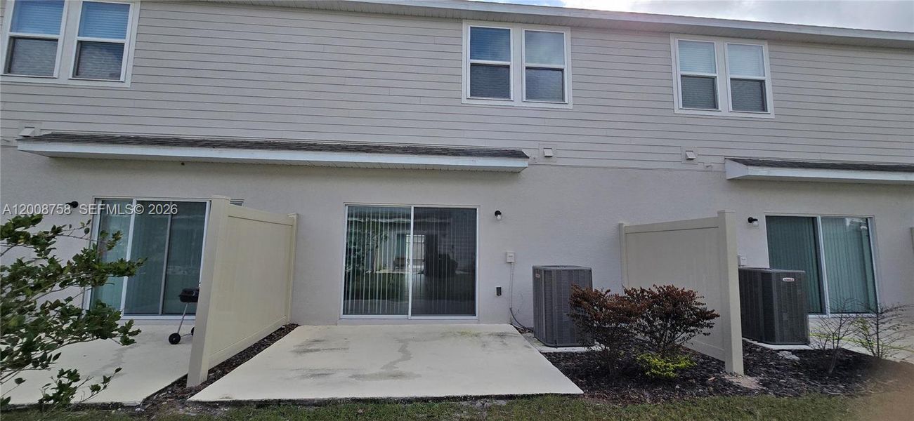 Exterior details and patio area of a home in , Davenport (Image 3).