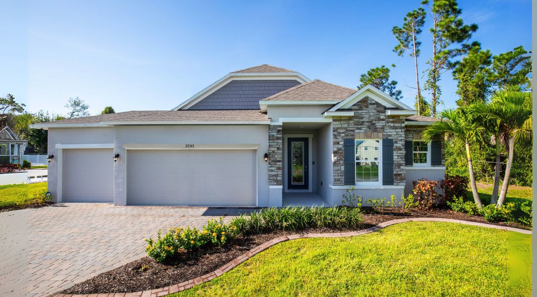 Front exterior of a new home in Silver Springs Shores, Ocala, FL, highlighting curb appeal (Image 20). Front exterior of a new home in Silver Springs Shores, Ocala, FL, highlighting curb appeal (Image 20).