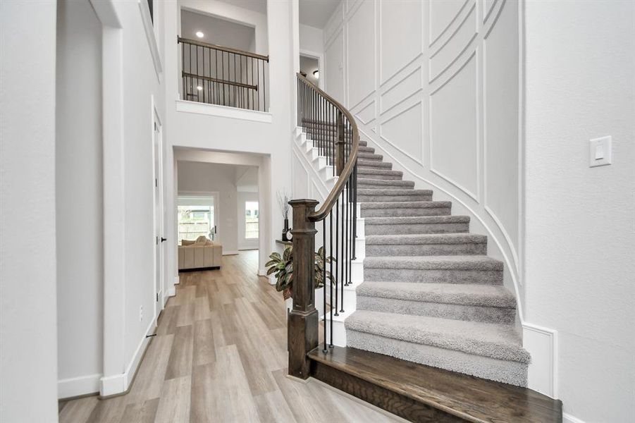 Spiral Stairs, high ceiling wide entrance makes this house a warn welcome to everyone.