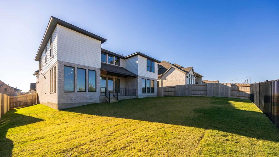 Exterior details and patio area of a home in Lariat 60', Liberty Hill (Image 3). Exterior details and patio area of a home in Lariat 60', Liberty Hill (Image 3).