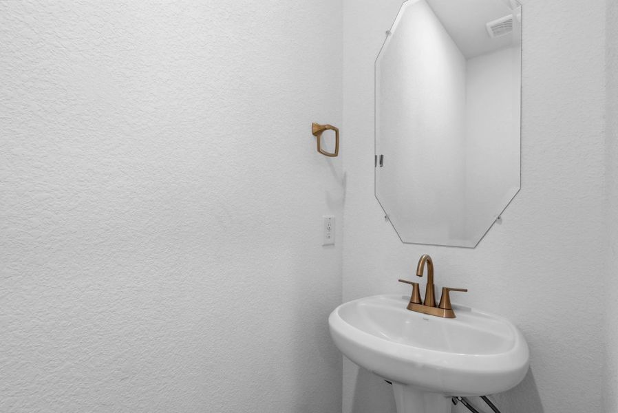 Powder bath. Sample product photo. Actual exterior and interior selections may vary by homesite. Photo may be virtually staged. Powder bath. Sample product photo. Actual exterior and interior selections may vary by homesite. Photo may be virtually staged.